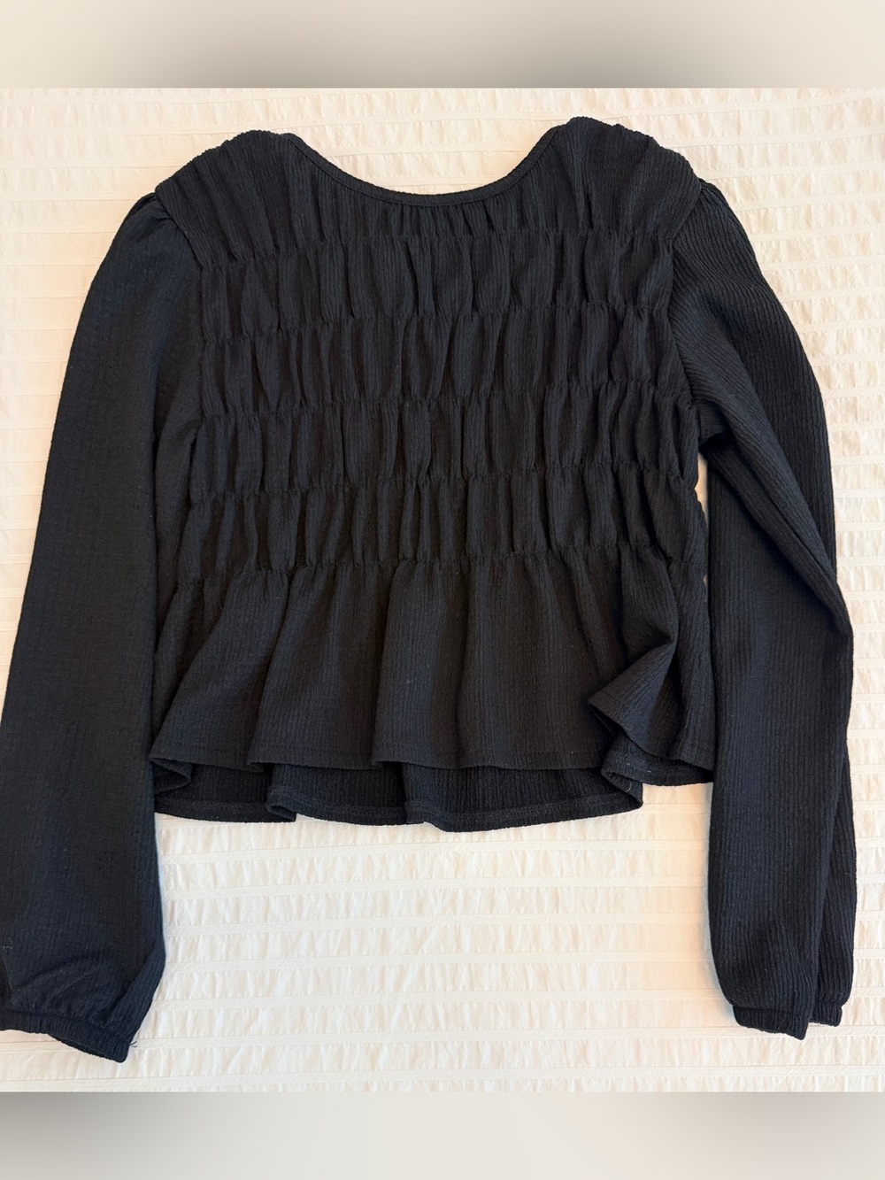 Mayoral Black Smocked Peplum Long Sleeve Top. Size:8